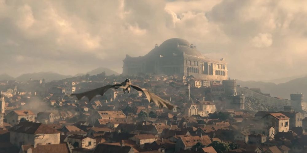A dragon flying over King's Landing in House of the Dragon