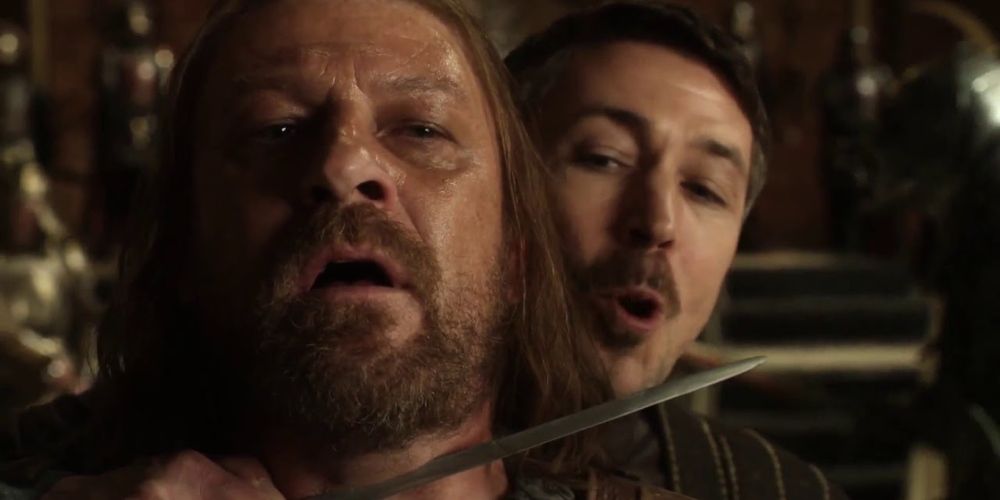 Littlefinger holds Ned Stark at knifepoint in Game of Thrones