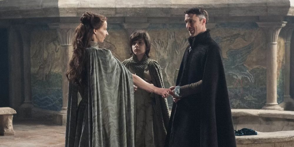 Littlefinger with Lysa and Robin Arryn in Game of Thrones.