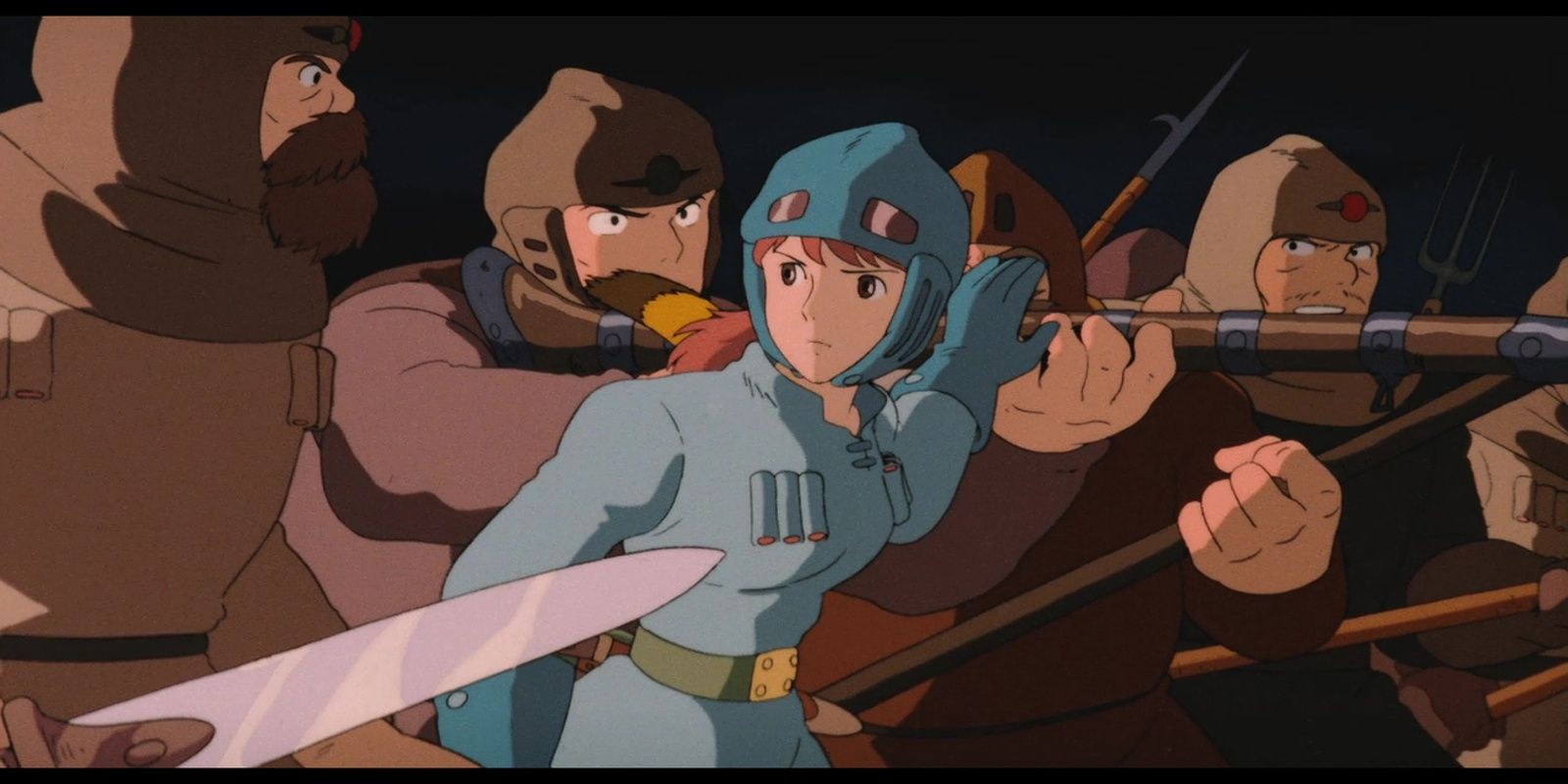Soldiers and villagers armed and running with Nausicaa in the Studio Ghibli film