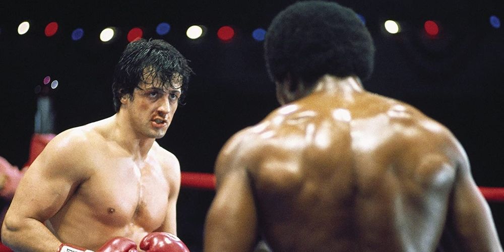 Rocky Balboa fighting Apollo Creed at the end of Rocky movie.