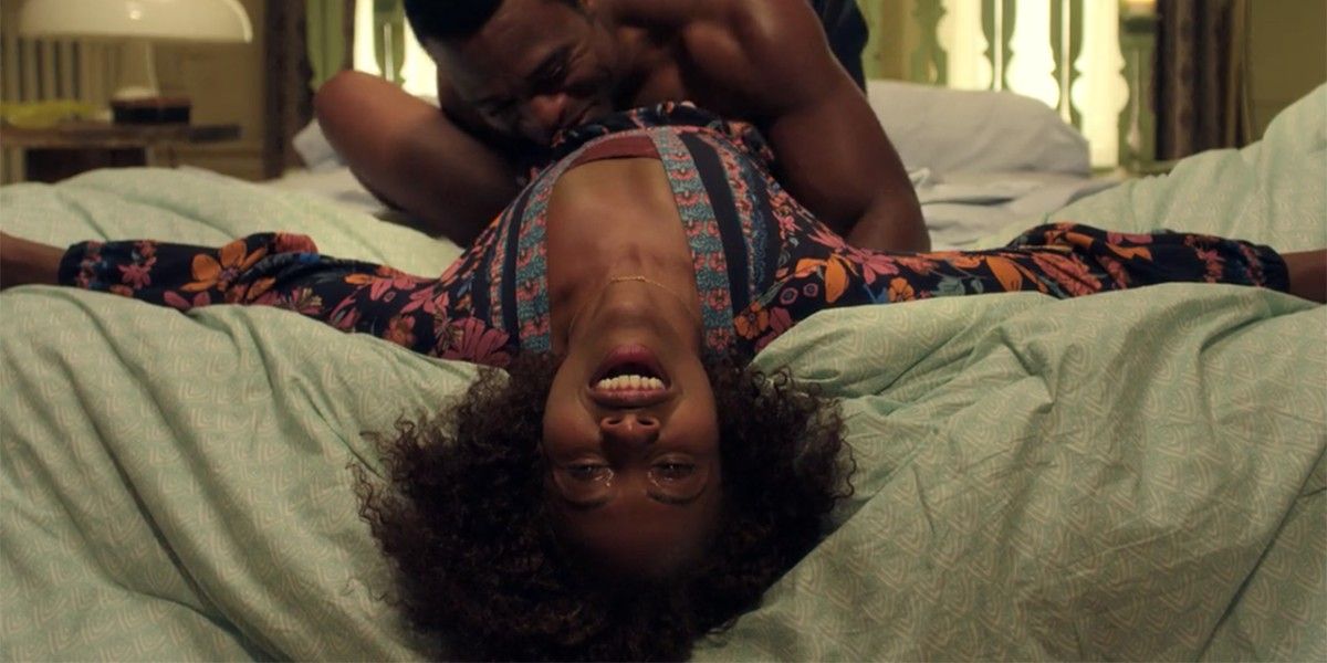 Nola Darling lies in bed with a lover