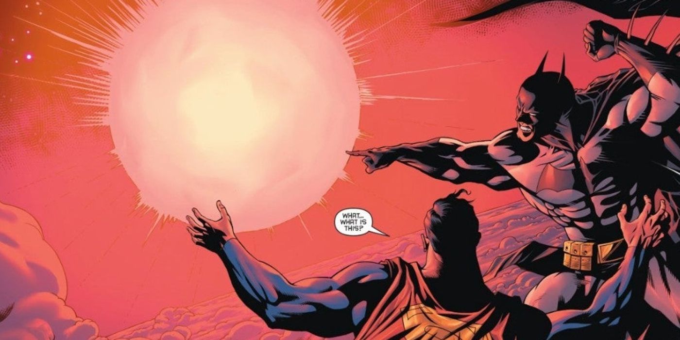 Superman and Batman looking at a red sun