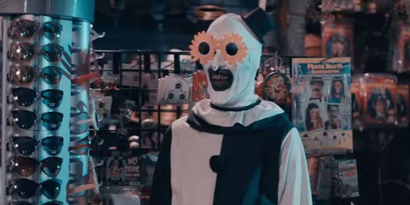 Art the Clown tries on silly glasses in Terrifier 2