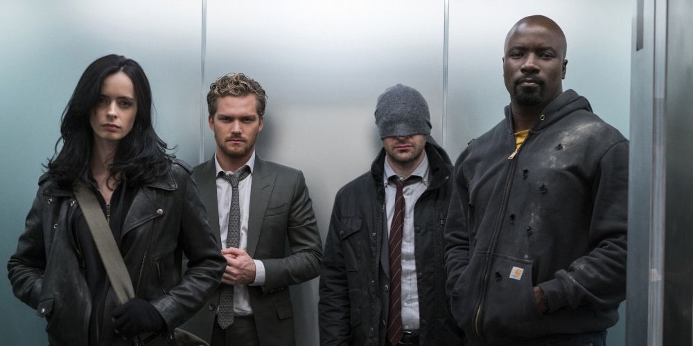 Jessica Jones, Iron Fist, Daredevil and Luke Cage in an elevator in The Defenders