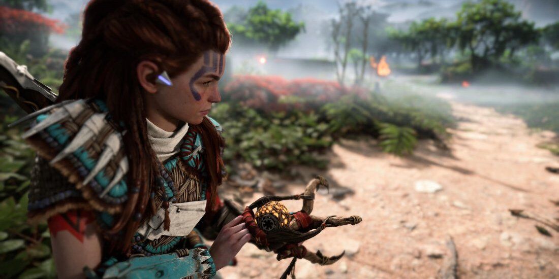 Aloy preparando as asas dos dez em Horizon Forbidden West.