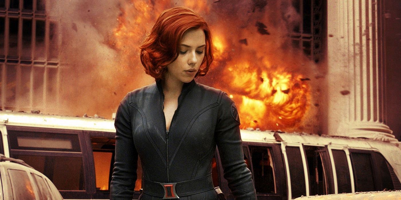 Scarlett Johansson as Black Widow in front of an explosion in the MCU