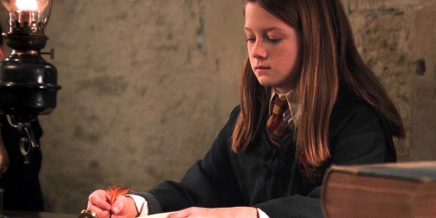 Ginny writing in Tom Riddle's diary in Harry Potter and the Chamber of Secrets