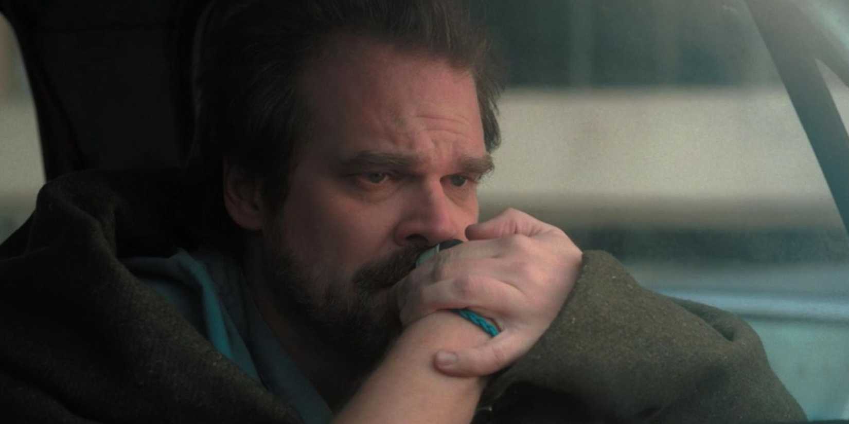 Jim Hopper, played by David Harbour, crying in Netflix's Stranger Things