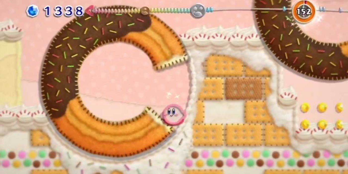 Kirby's Epic Yarn Sweets Park Kirby in a donut hole