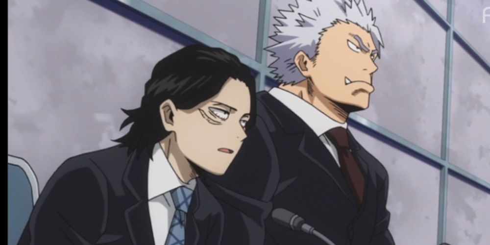 Aizawa and Vladking at the press conference in My Hero Academia