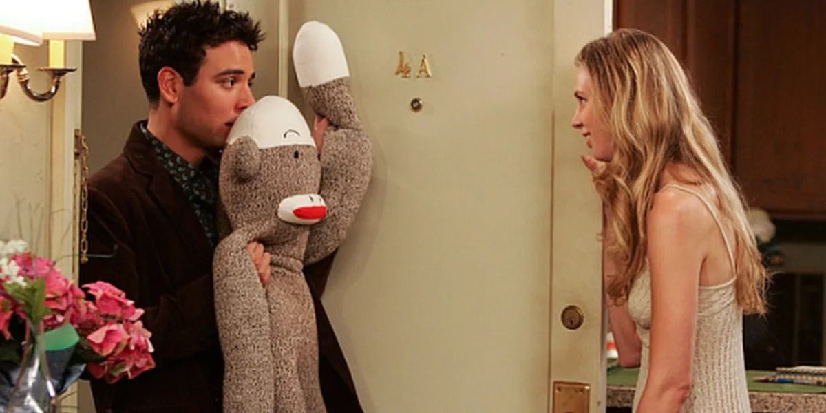 Ted holds up stuffed animal to Natalie - How I Met Your Mother