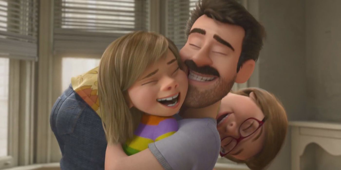 Riley laughing and hugging her parents in Inside Out.