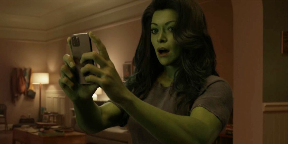 she-hulk looking at her phone with shocked expression
