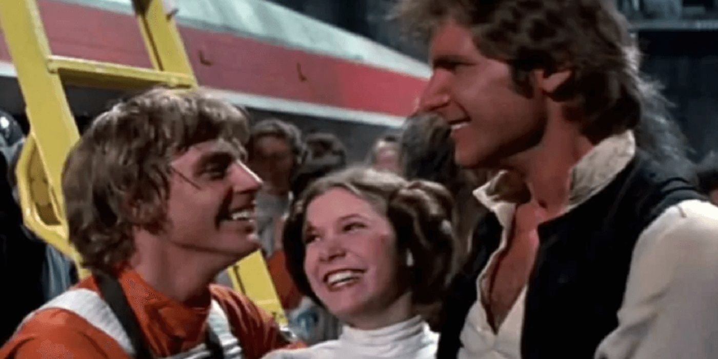 Luke, Leia and Han Solo all smiling in A New Hope 