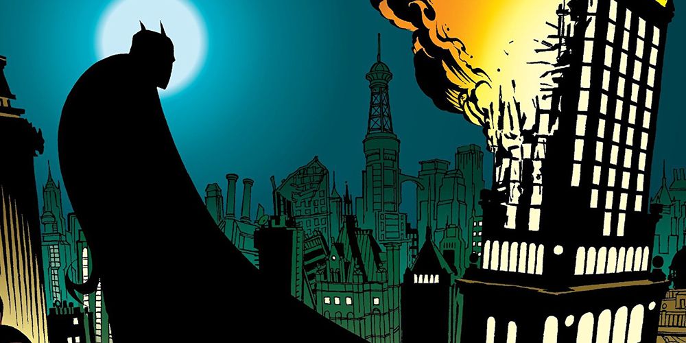 Batman looks over an earthquake-devastated Gotham City