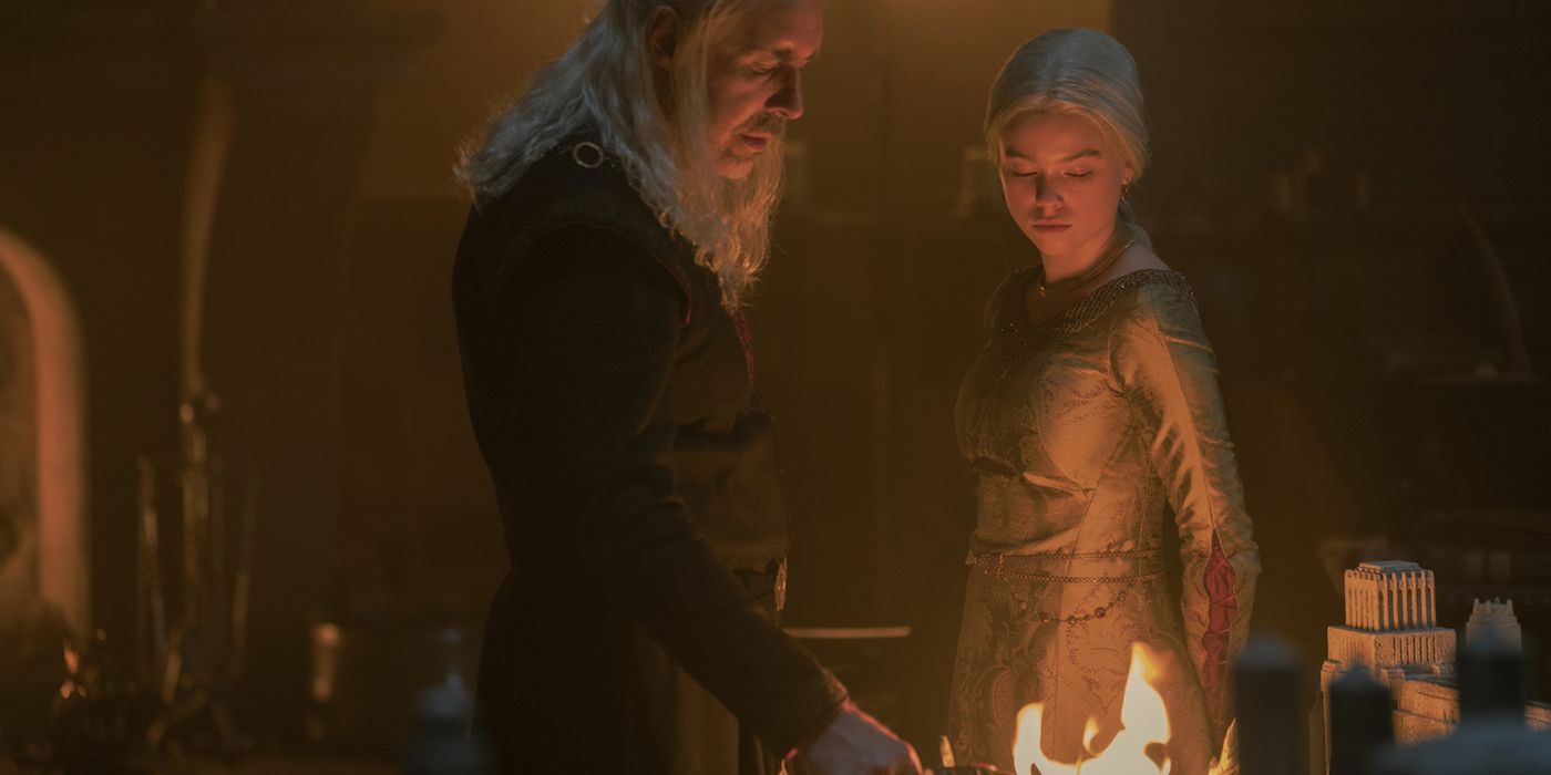 Viserys and Rhaenyra looking at fire in House of the Dragon.