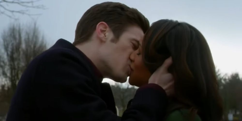 Barry Allen kissing Iris West in The Flash