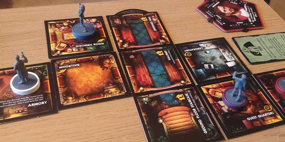 Several players exploring in Betrayal at House on the Hill game.