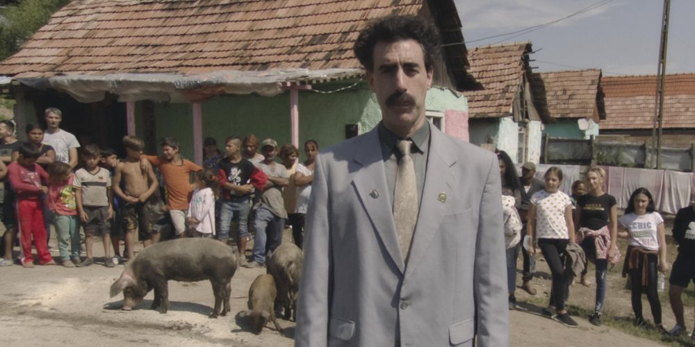 Borat in Kazakhstan with a pig