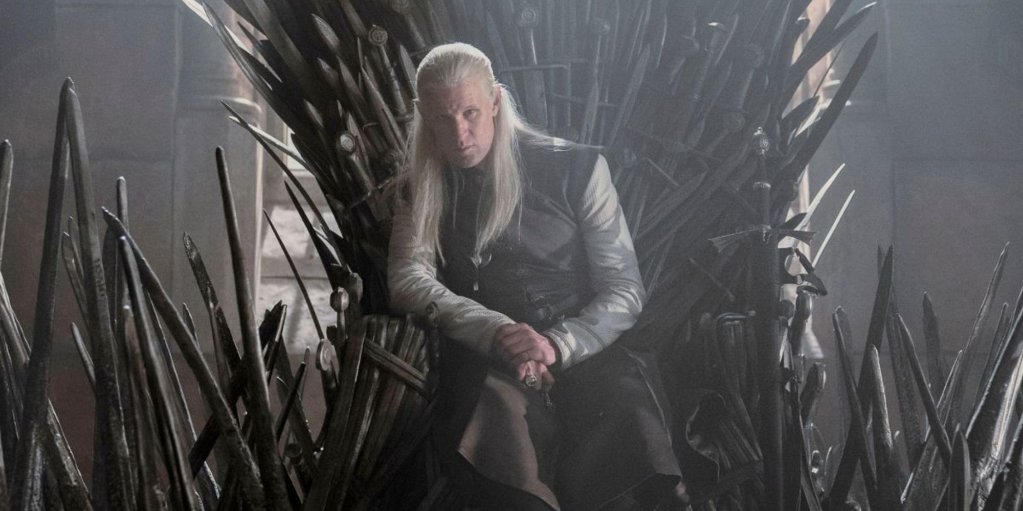 Daemon Targaryen sitting on the Iron Throne in House of the Dragon