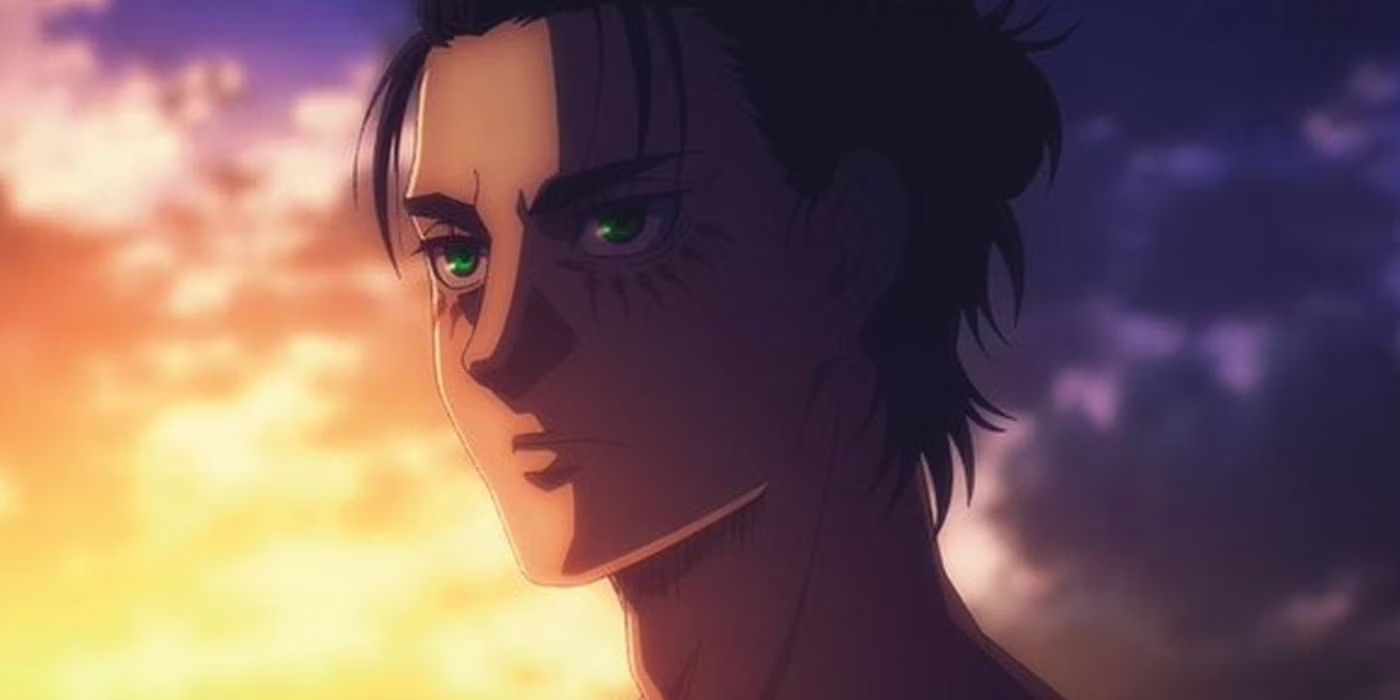 A closeup shot of Eren Yeager from Attack on Titan with Titan scars under his eyes and his long hair pulled into a bun. 