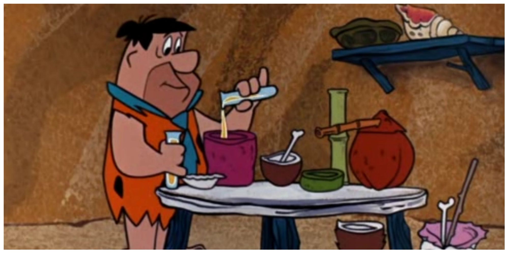 Fred Flinstone in his lab in the Flintstones