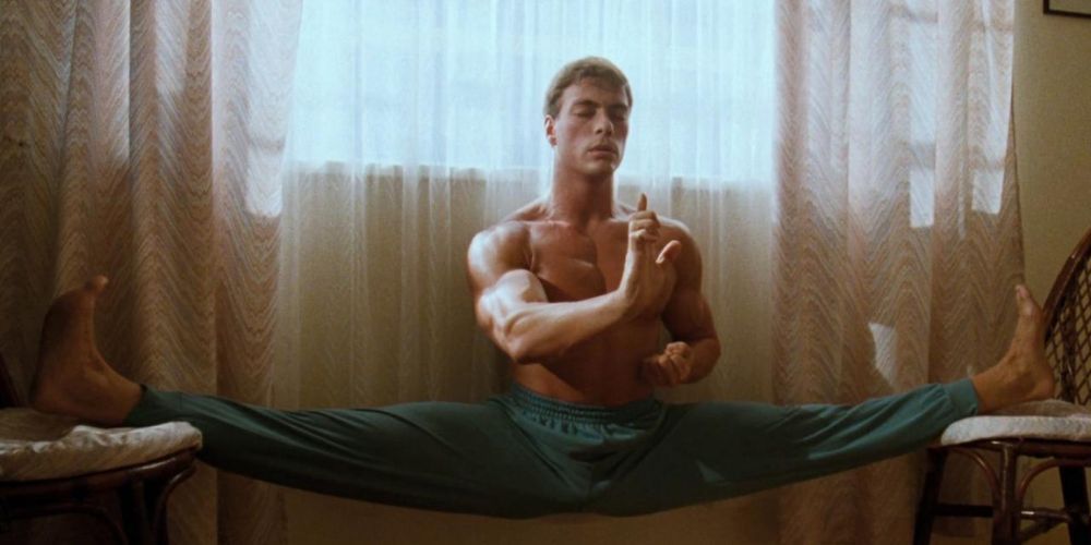 Jean Claude Van Damme doing the splits over two chairs