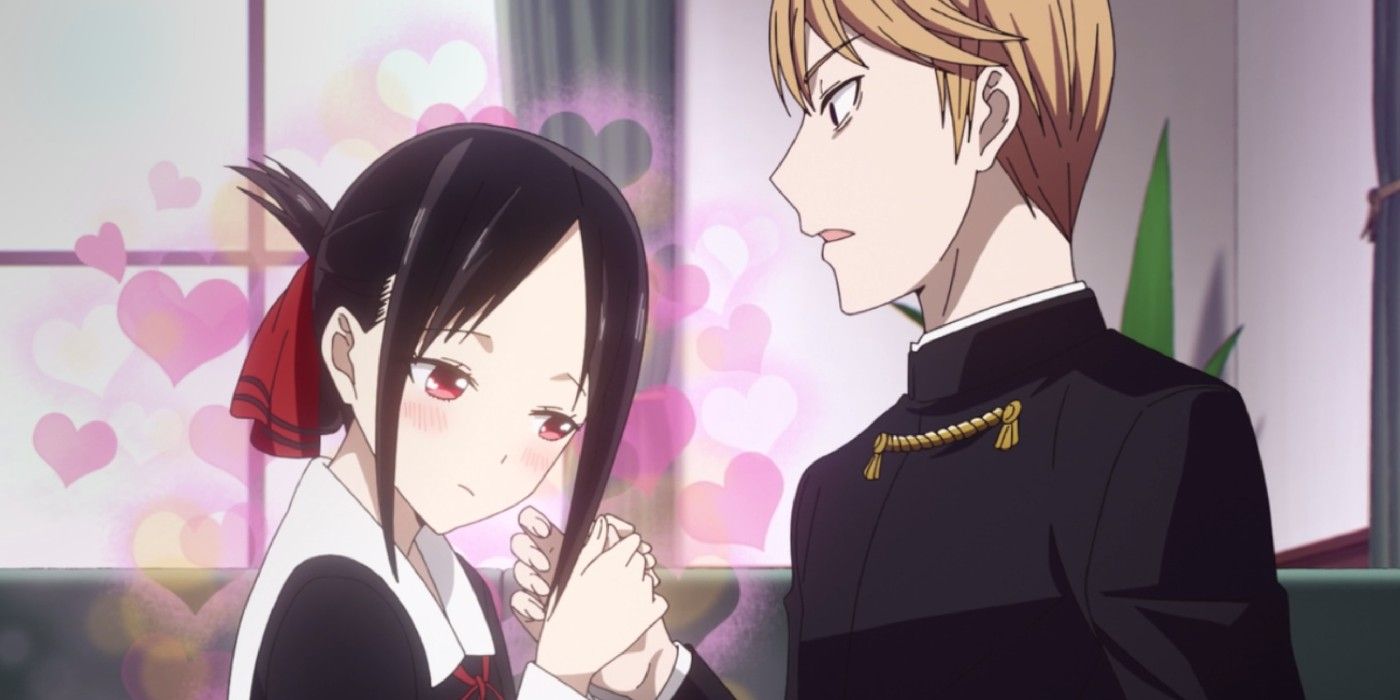 Kaguya blushes as Miyuki and her hold hands in Kaguya-Sama: Love is War.