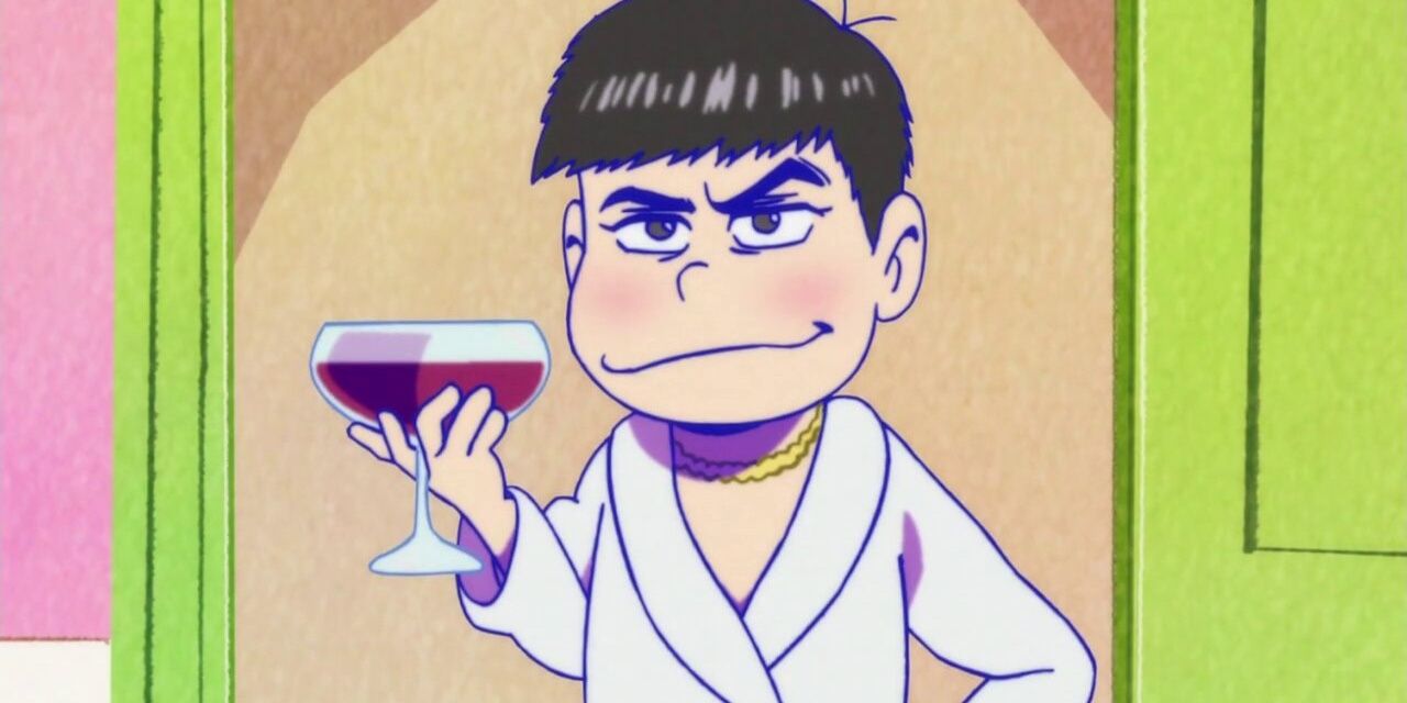 Karamatsu wearing a robe and a gold chain necklace while holding a glass of wine