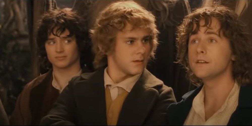 Frodo, Merry, and Pippin listen to Elrond in The Lord of the Rings