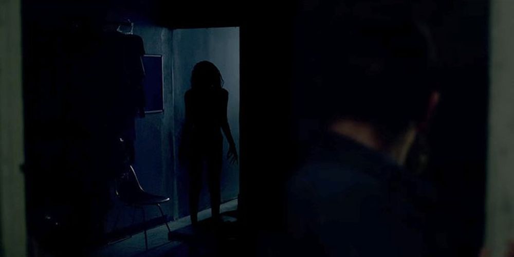 Ghost reveals herself in the darkness during Lights Out Jump Scare