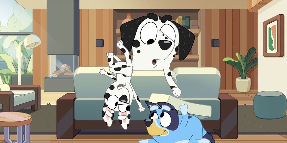 A Bluey character interacts with two Dalmatians in the episode "Octopus"