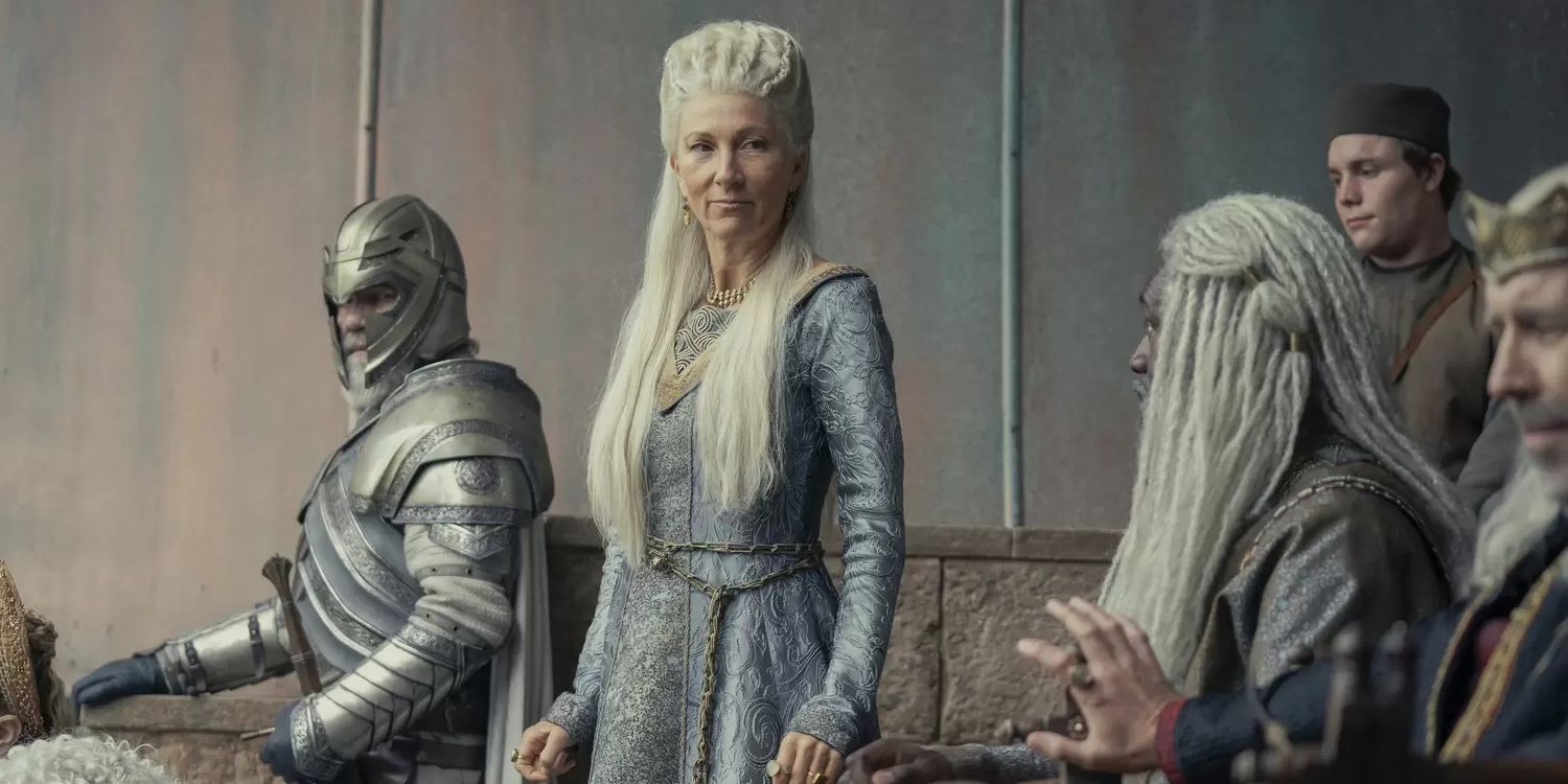 Princess Rhaenys Targaryen is standing up and looking at King Viserys I in House of the Dragon.
