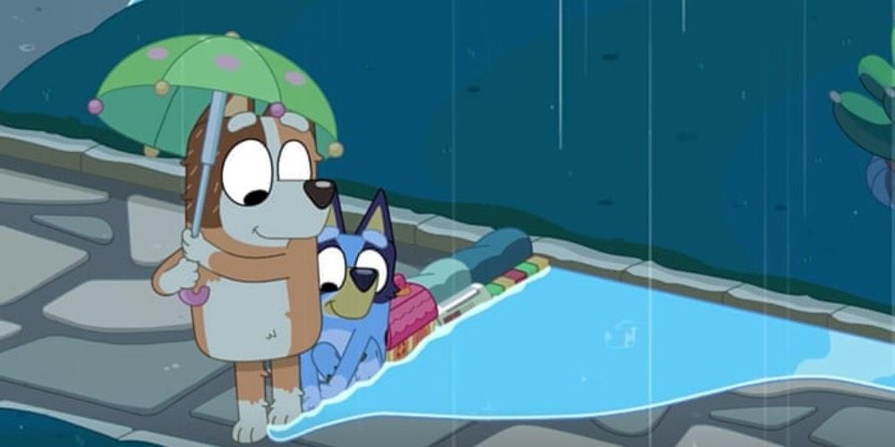 Two of the heelers from Bluey admire the rain in the episode "Rain"