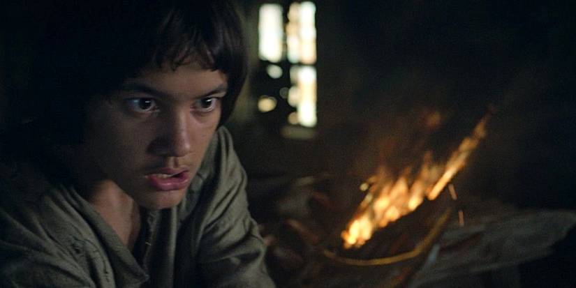 Theo's sword lights aflame in The Rings of Power