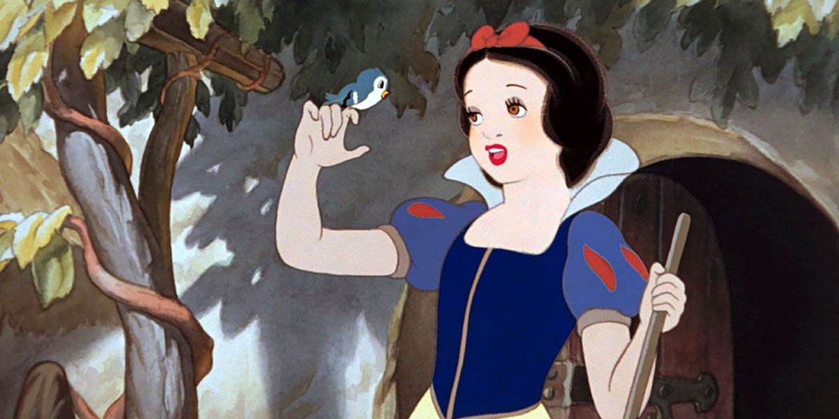 A bird perches on Snow White hand In Snow White And The Seven Dwarfs