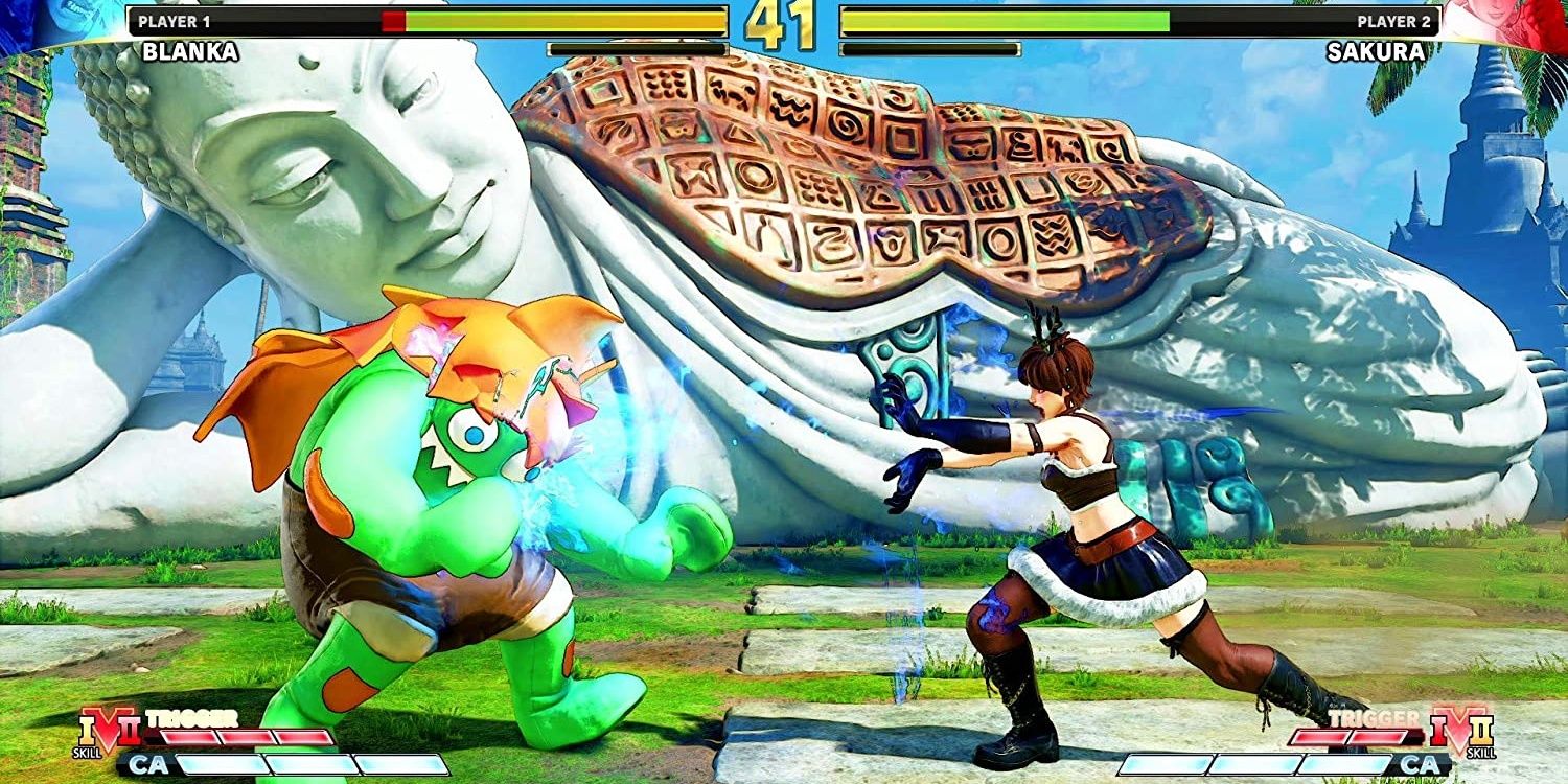 Blanka em seu traje Blanka-chan é atingido pelo Hadouken de Sakura em Street Fighter V