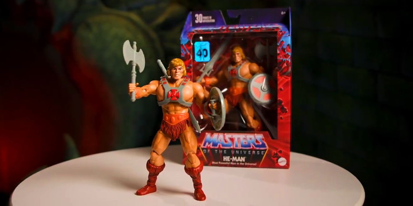 The 40th anniversary He-Man figure stands alongside his packaging