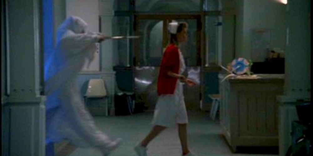 Nurse gets chased by ghost with scissors in Exorcist III Jump Scare