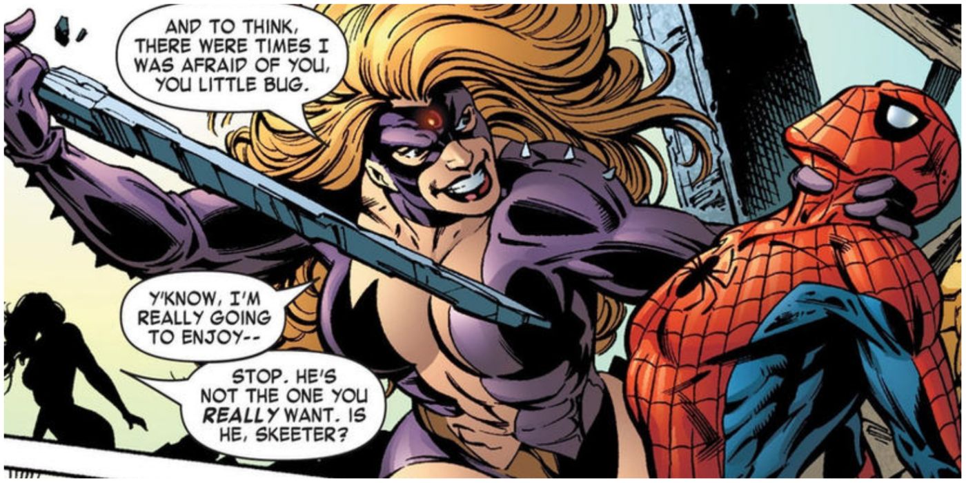 Titania holding a weapon to Spider-Man's chest in Marvel comics