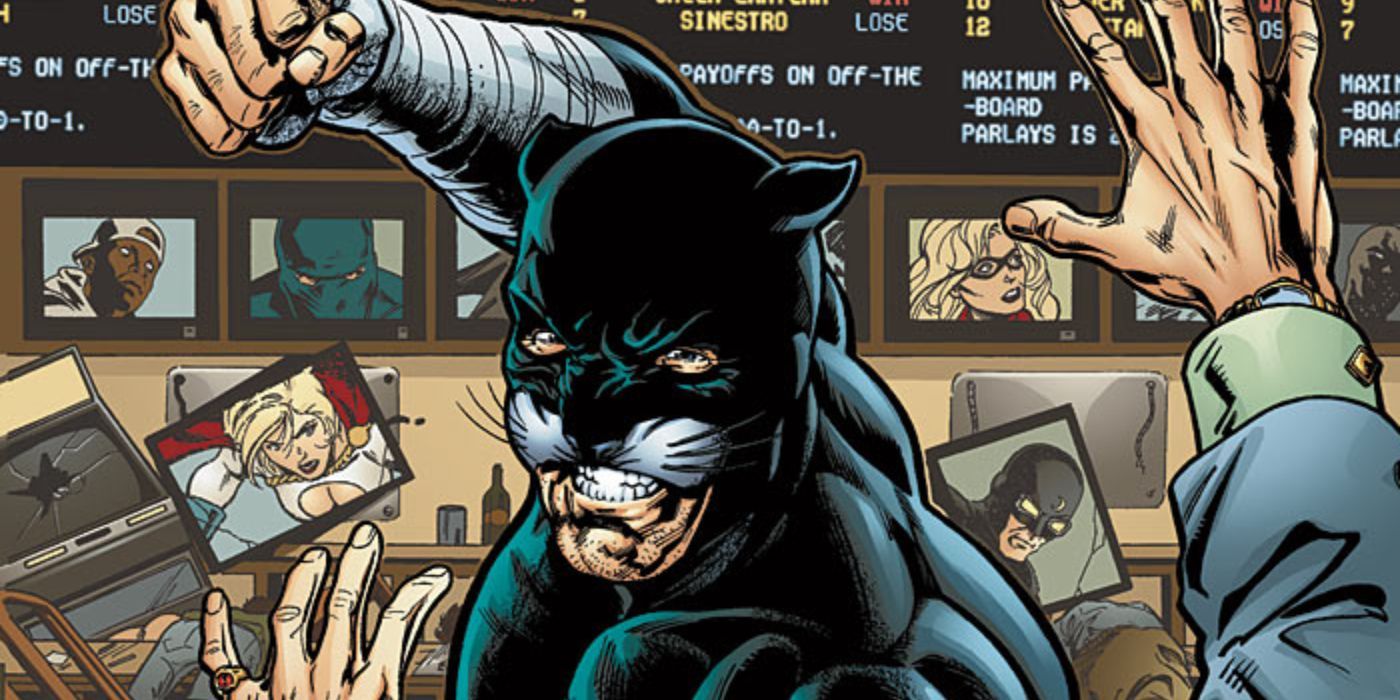 Wildcat Ted Grant swings a fist at an unseen assailant in DC Comics