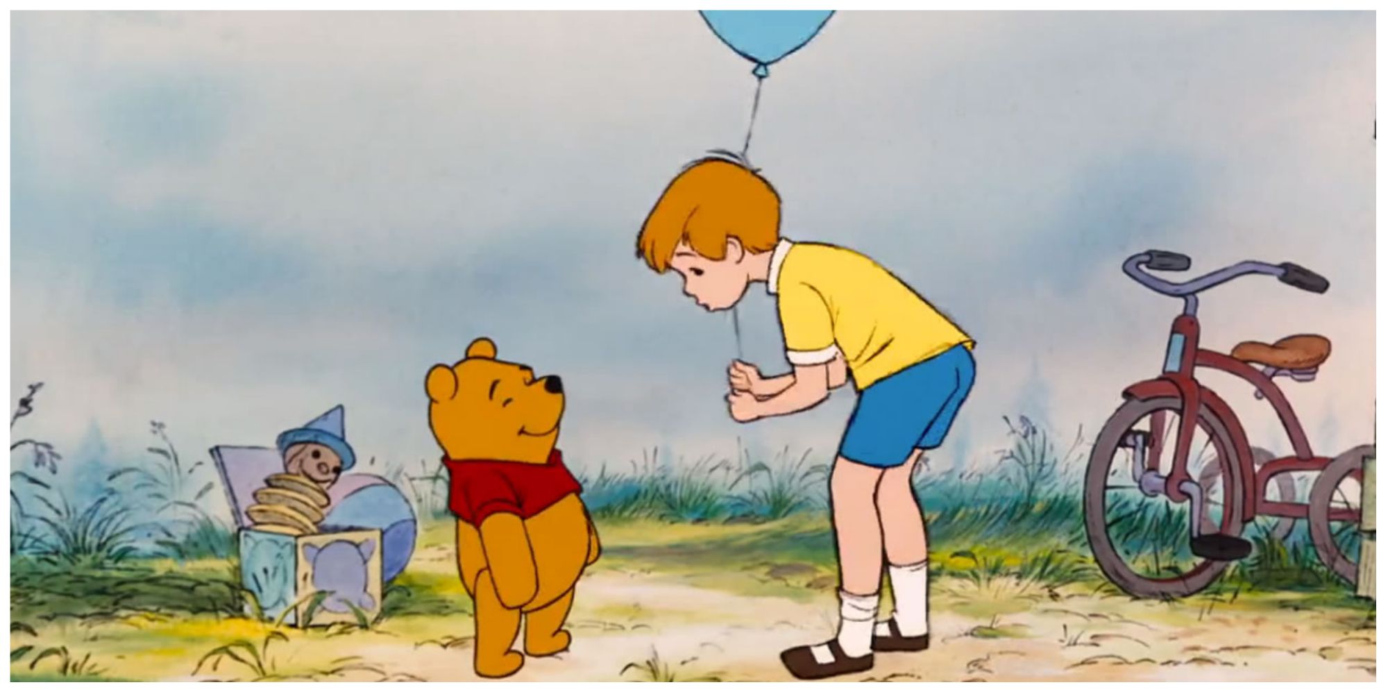 Pooh bear and Christopher Robin in the Many Adventures of Winnie the Pooh