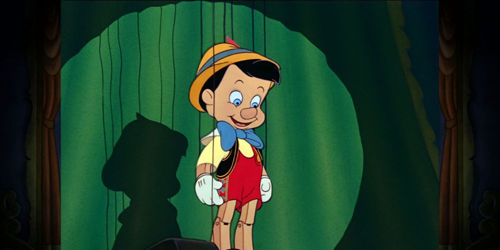 An image of Pinocchio attached to strings like a puppet in the original Pinocchio film