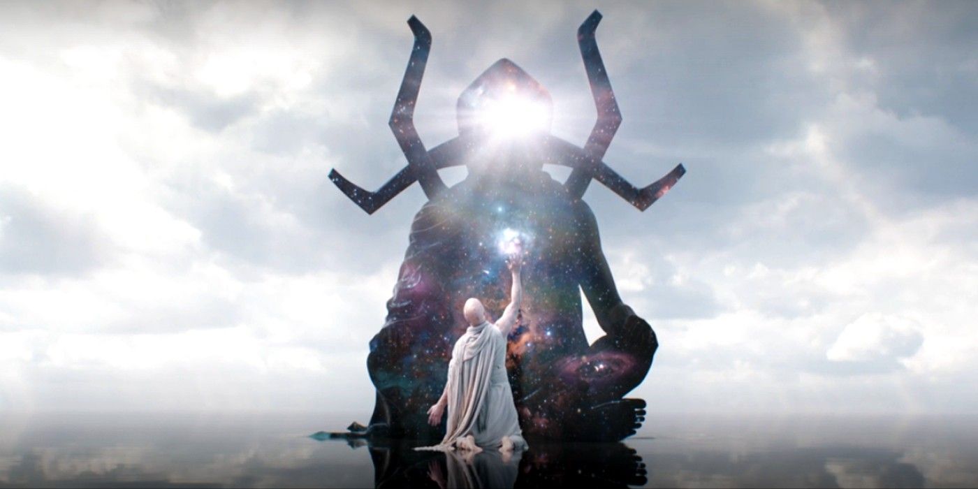 Gorr the God Butcher kneels in front of Eternity in a still from Thor: Love and Thunder