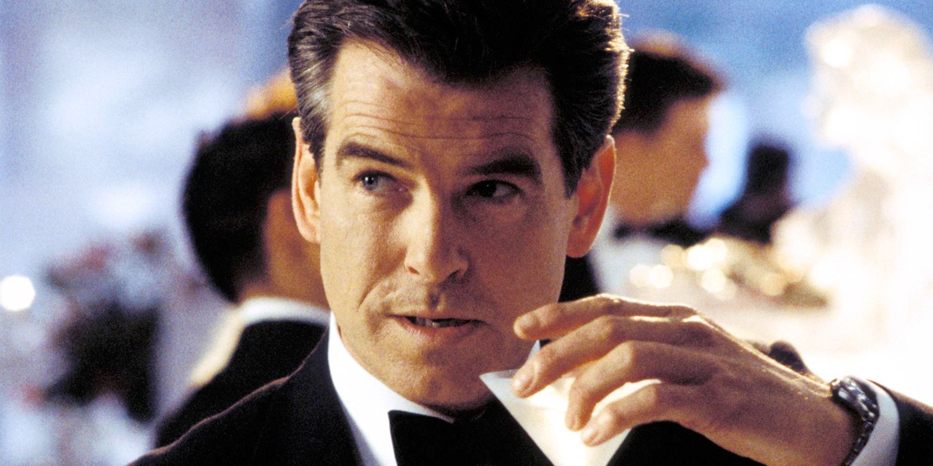 Pierce Brosnan as James Bond holds a drink in Die Another Day