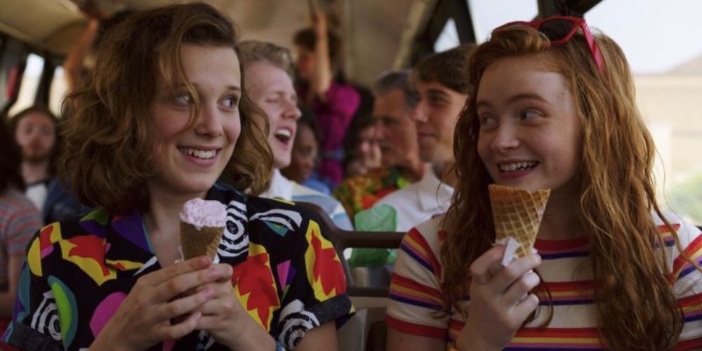 Max and Eleven with ice creams on the bus in Stranger Things