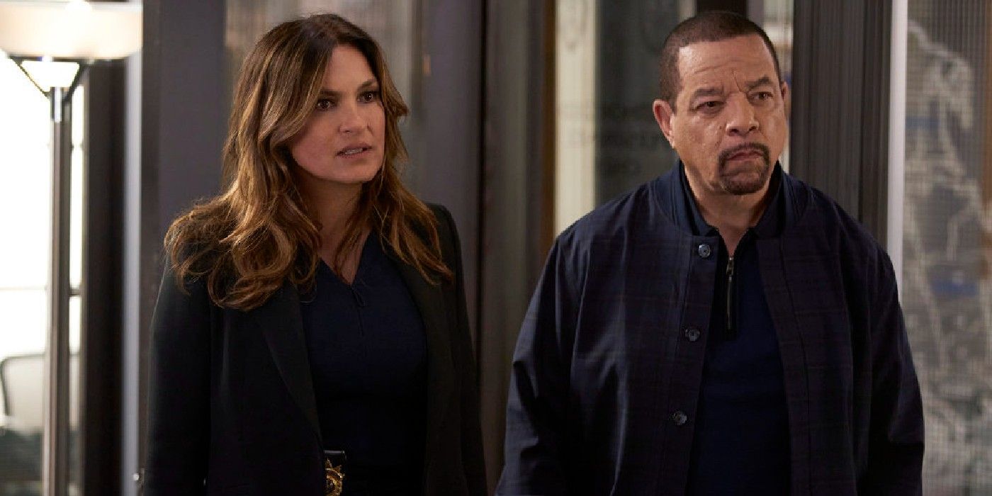 Law & Order: SVU - Benson and Fin stand together in a courthouse lobby