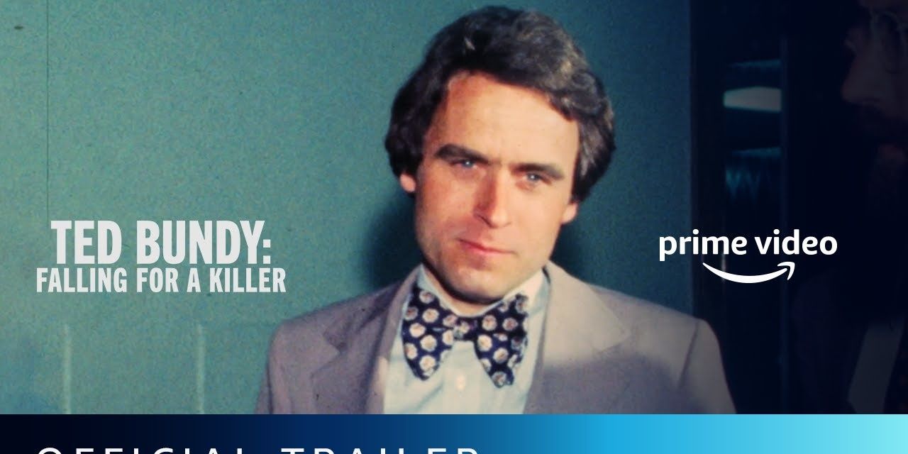 Serial kill Ted Bundy wearing a suit and bow tie