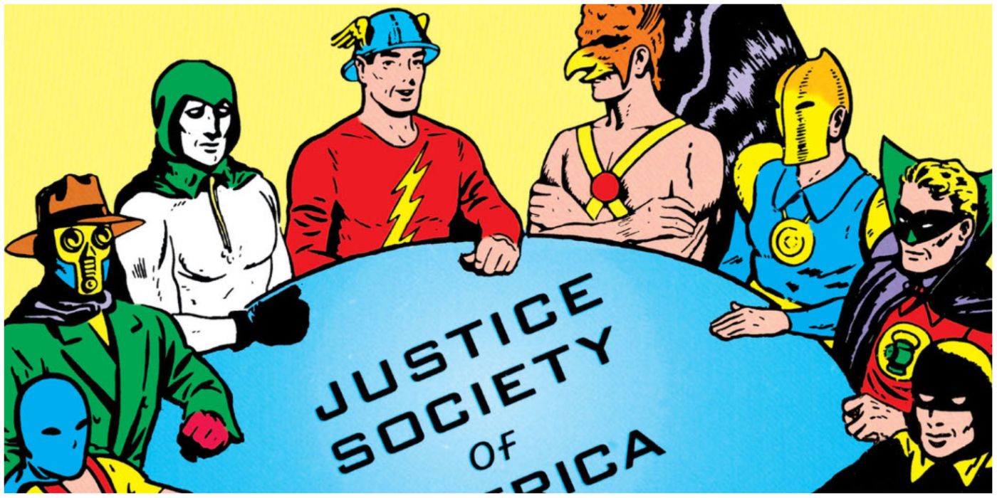 the Justice Society of America sitting together at their table in DC Comics